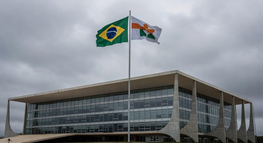 Edifício da Câmara Legislativa do DF em Brasília com bandeiras, representando homenagem controversa a ministro do TST em meio a críticas por desvio de recursos públicos.